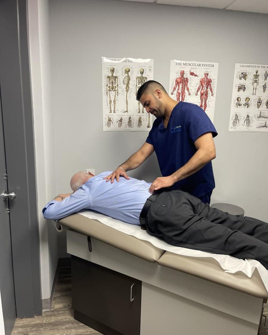Doctor treating lower back